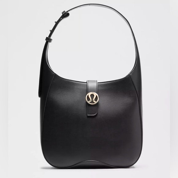 lululemon athletica Handbags - NWT lululemon athletica Leather Alternative Shoulder Bag 8L Black/Gold